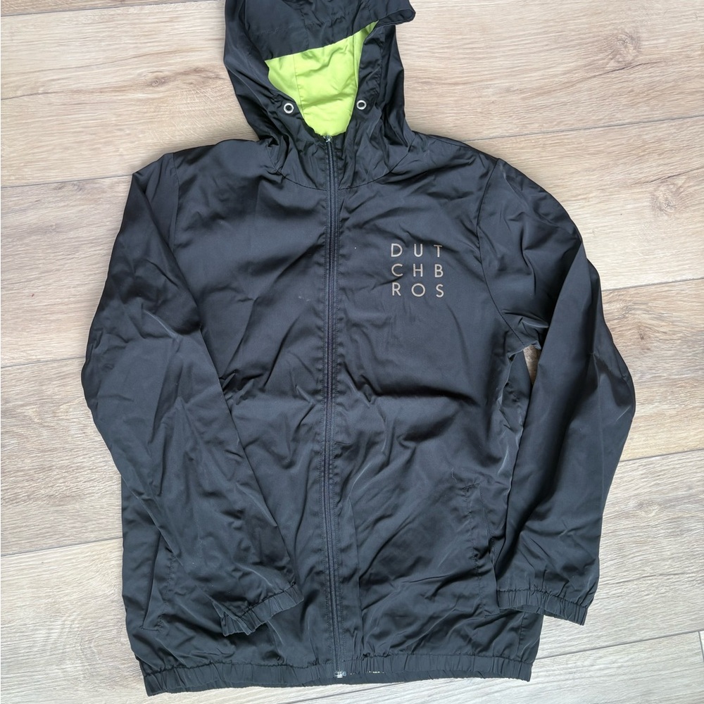 Dutch Bros Black Windbreaker with Green Lining